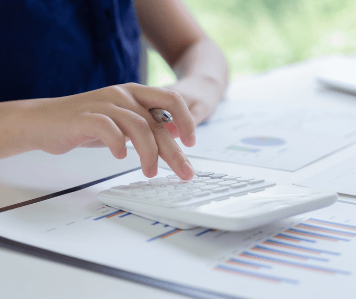 typing on a calculator